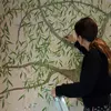 Jo Bird adding details to the Willow Tree